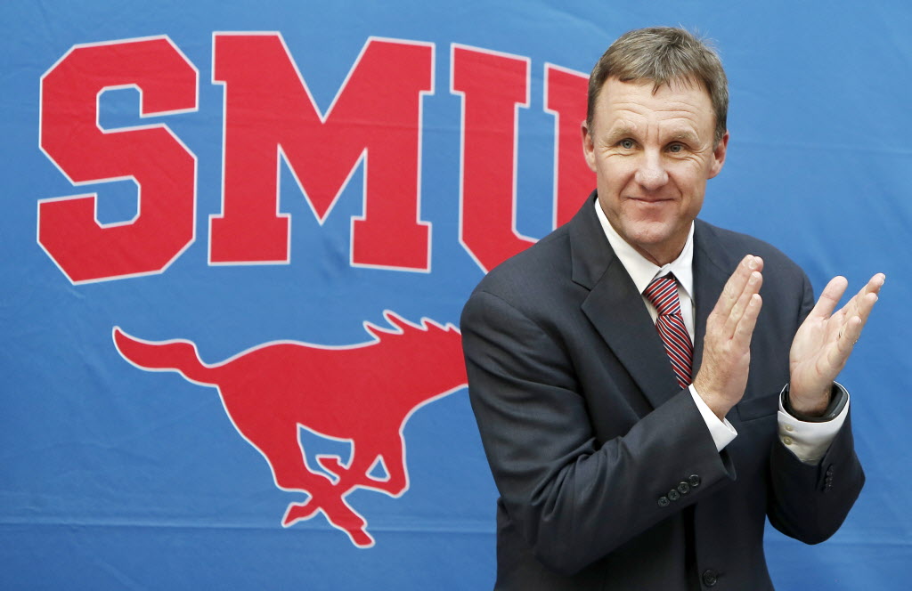 Chad Morris acknowledges SMU football fans during a press conference announcing him as the schools new head football coach, Monday, December 1, 2014. (Brandon Wade/Special Contributor)