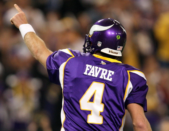 CARLOS GONZALEZ ¥ cgonzalez@startribune.com  November 15, 2009 - Minneapolis, MN - The Metrodome - NFL - Minnesota Vikings vs. Detroit Lions  ]  Minnesota quarterback Brett Favre (4) celebrated after throwing a touchdown pass to tight end Jeff Dugan (83) in the fourth quarter. Minnesota beat Detroit by a final score of 27-10. Favre had 344-yards passing.